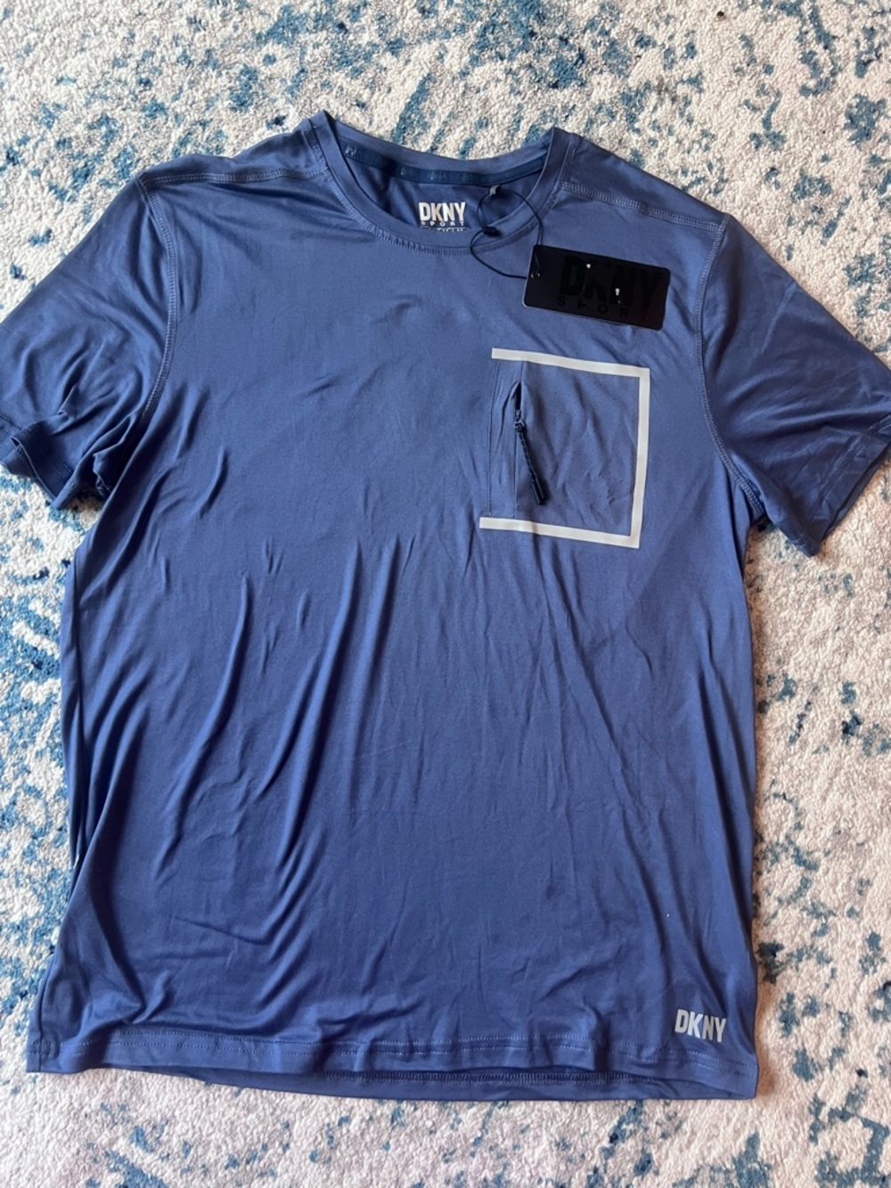 Dkny Men's Short Sleeve Performance Tee in Slate Blue with Reflective Pocket